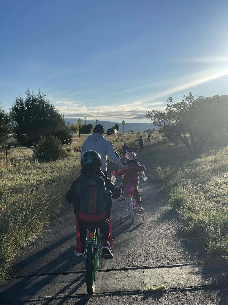 kids and parent with bikes