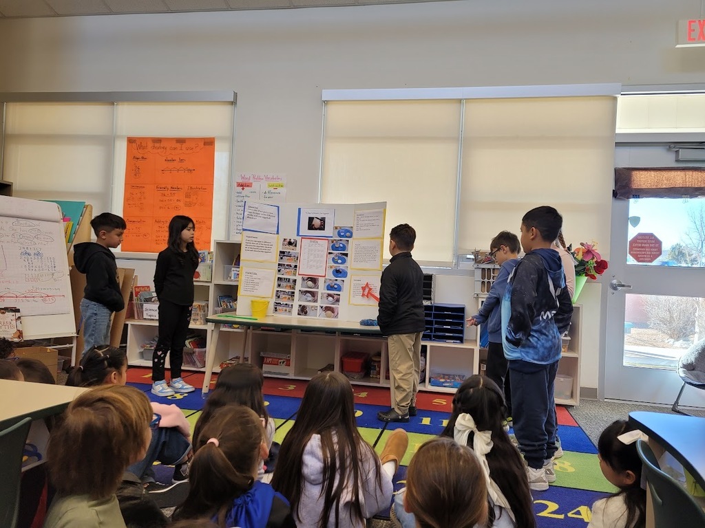 kids with their science fair projects