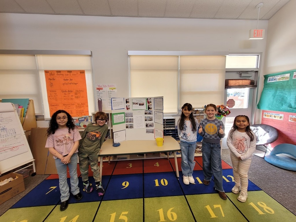 kids with their science fair projects