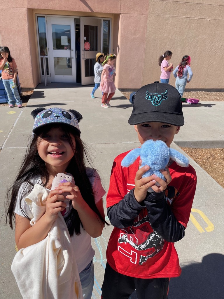 girl and boy with hat