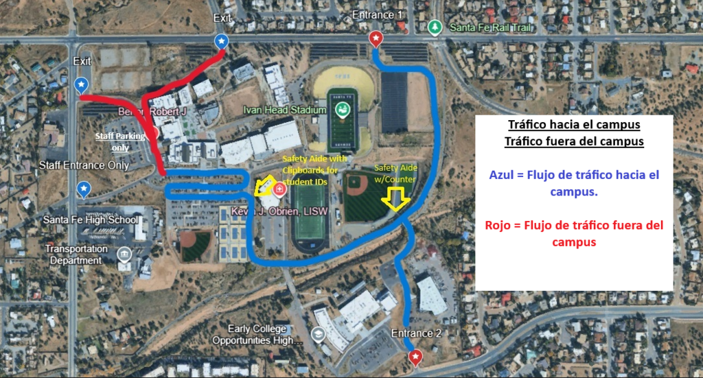 Map with blue and red lines shows a route for walking around the campus. Buildings, roads, and green areas are visible.