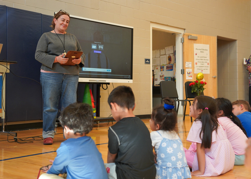 Friedrichs smiles at students