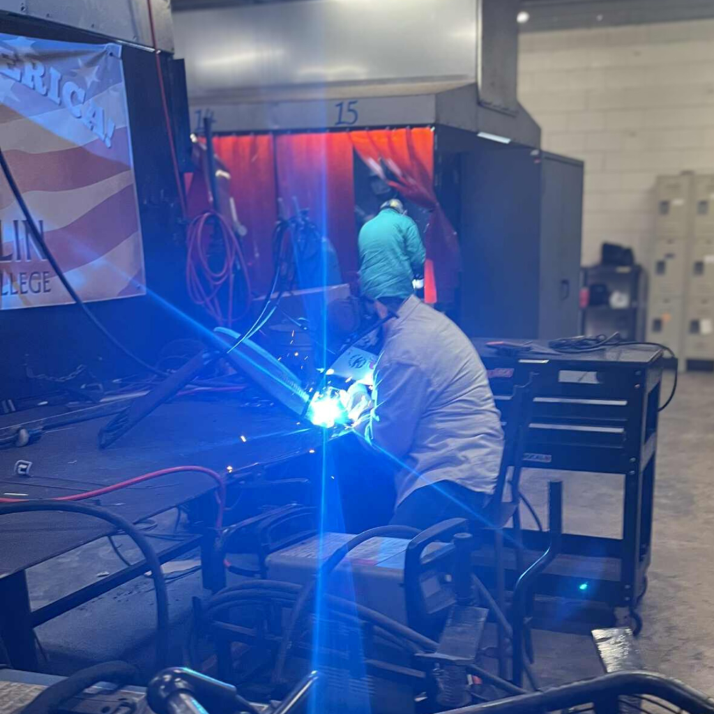 Welding student in action.