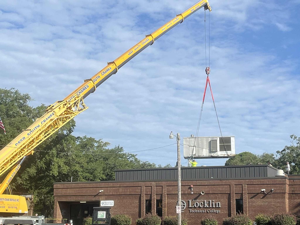 Crane Removing HVAC System