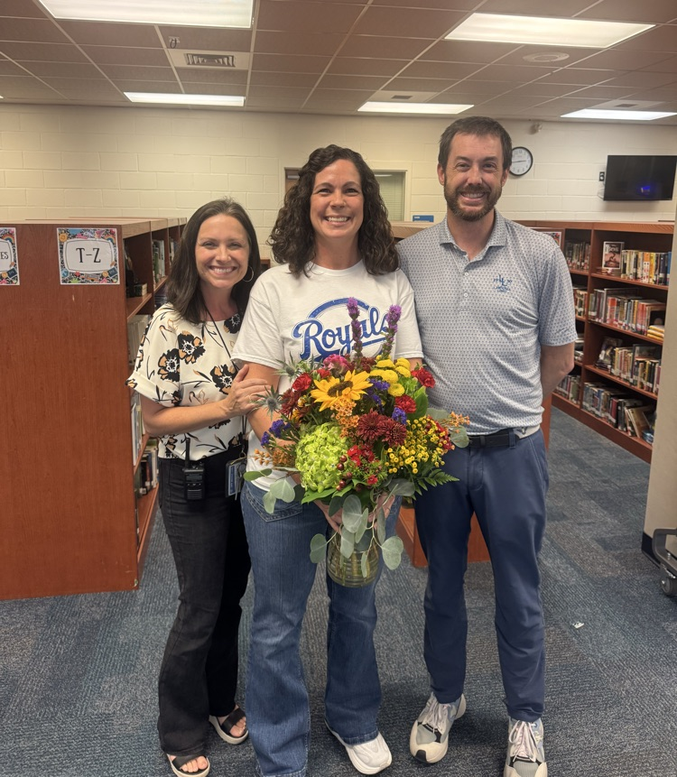 Aaron Lowry with Mr pape and Mrs hall