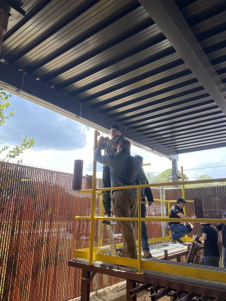 Welding Training Platform Project Assembly- Students Adding Tether Attachment