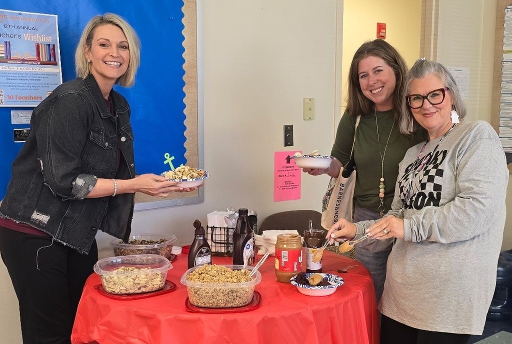 teachers eating and smiling