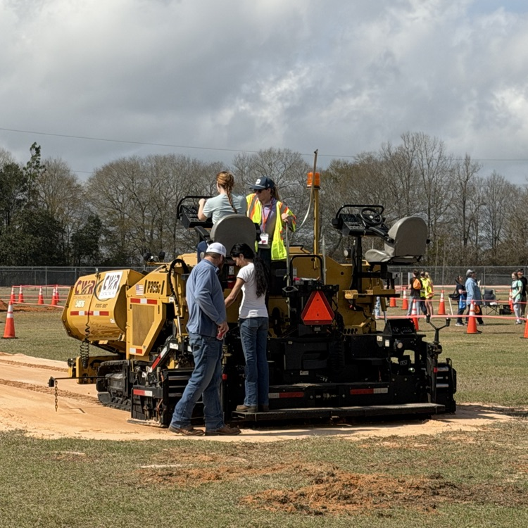 girls driving heavy equipment 