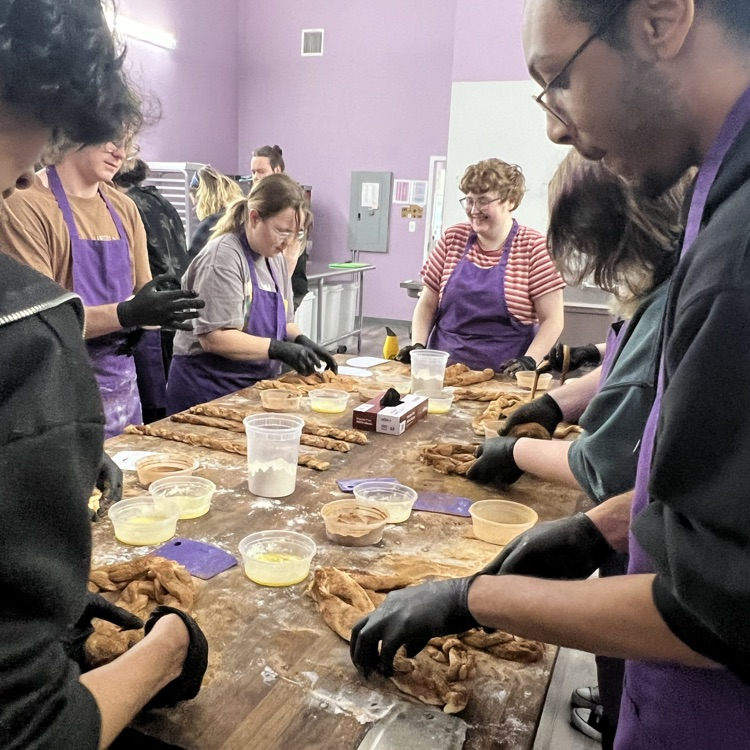 students smiling and baking 