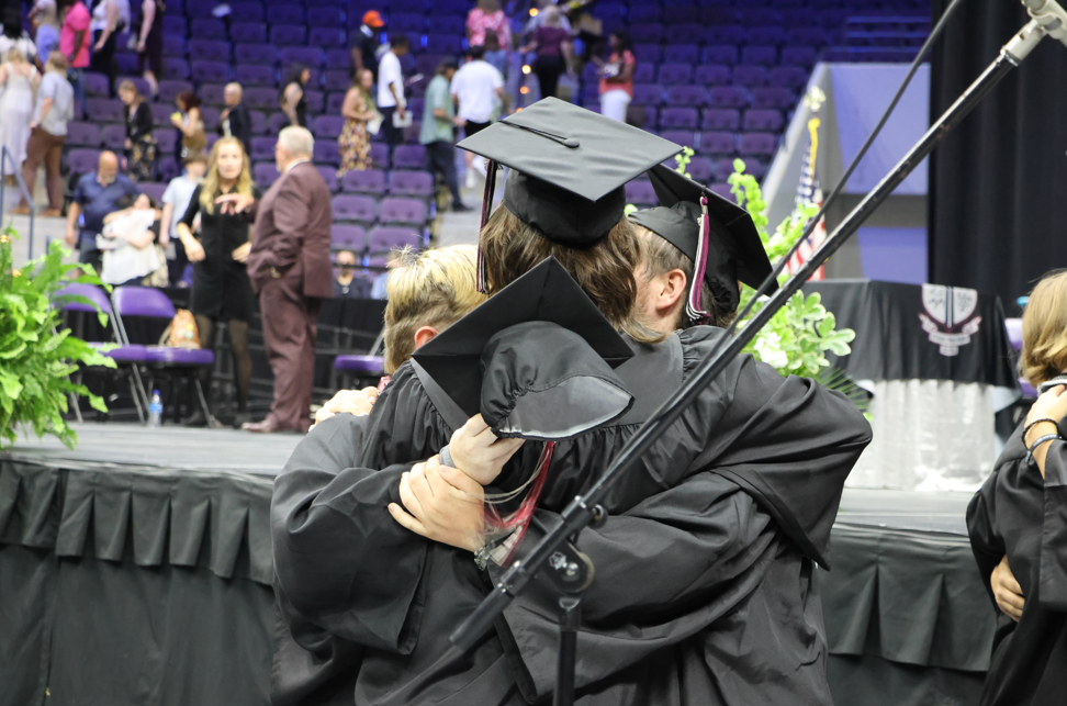 celebratory hugs