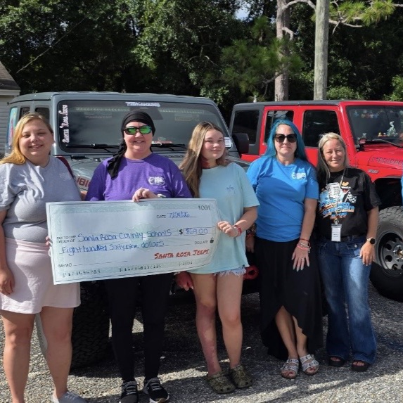 Santa Rosa jeeps donates to meal debt