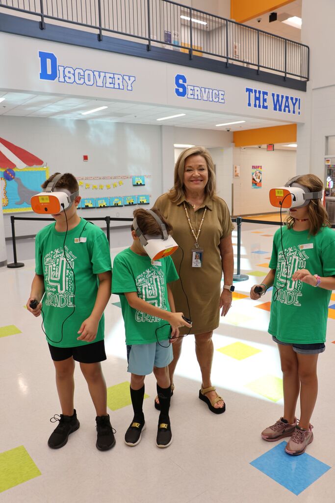 April Martin, Dir. of Elementary Education, with East Bay students