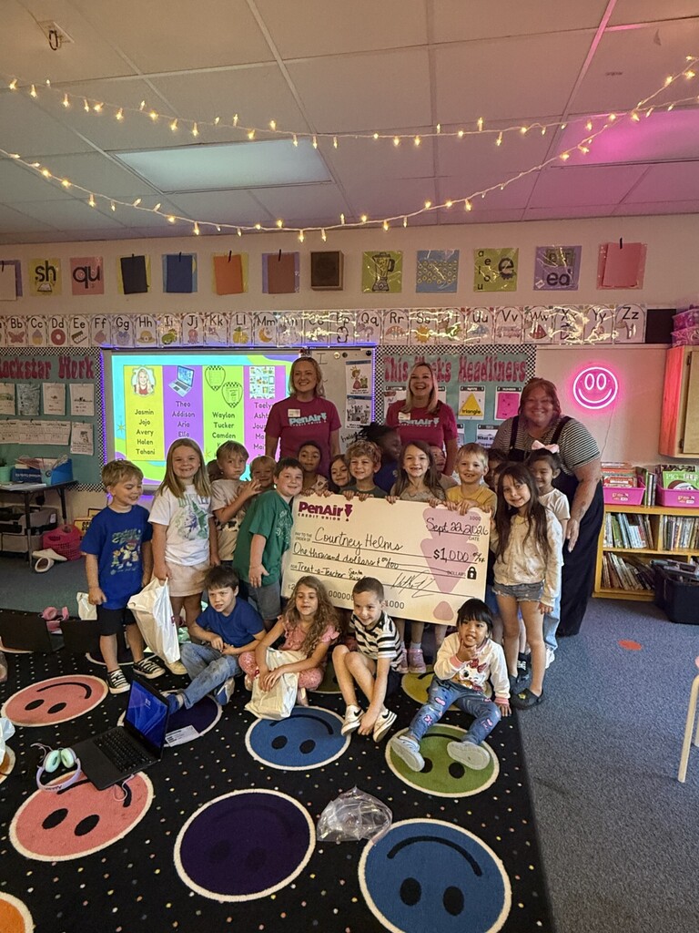 Courtney Helms, Kindergarten classroom, receiving Pen Air Credit Union Award