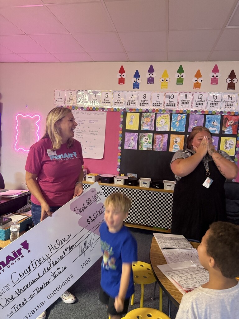 Courtney Helms, Kindergarten classroom, receiving Pen Air Credit Union Award