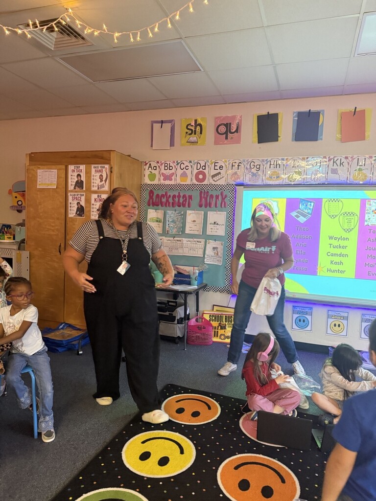 Courtney Helms, Kindergarten classroom, receiving Pen Air Credit Union Award