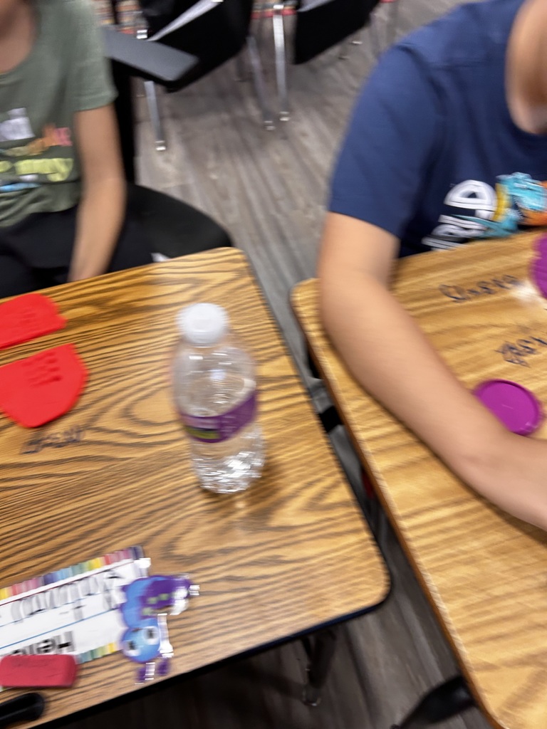 3rd Grade students participating in a hands on math activity