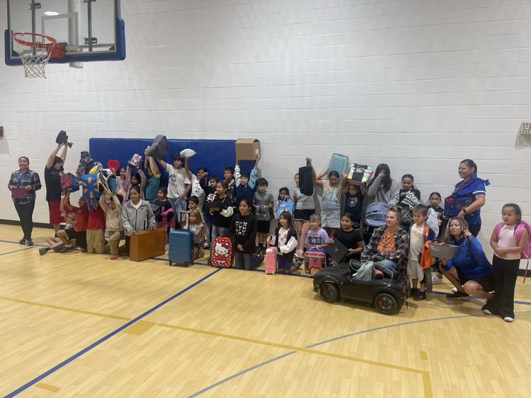 elementary students with their items for anything but a backpack 