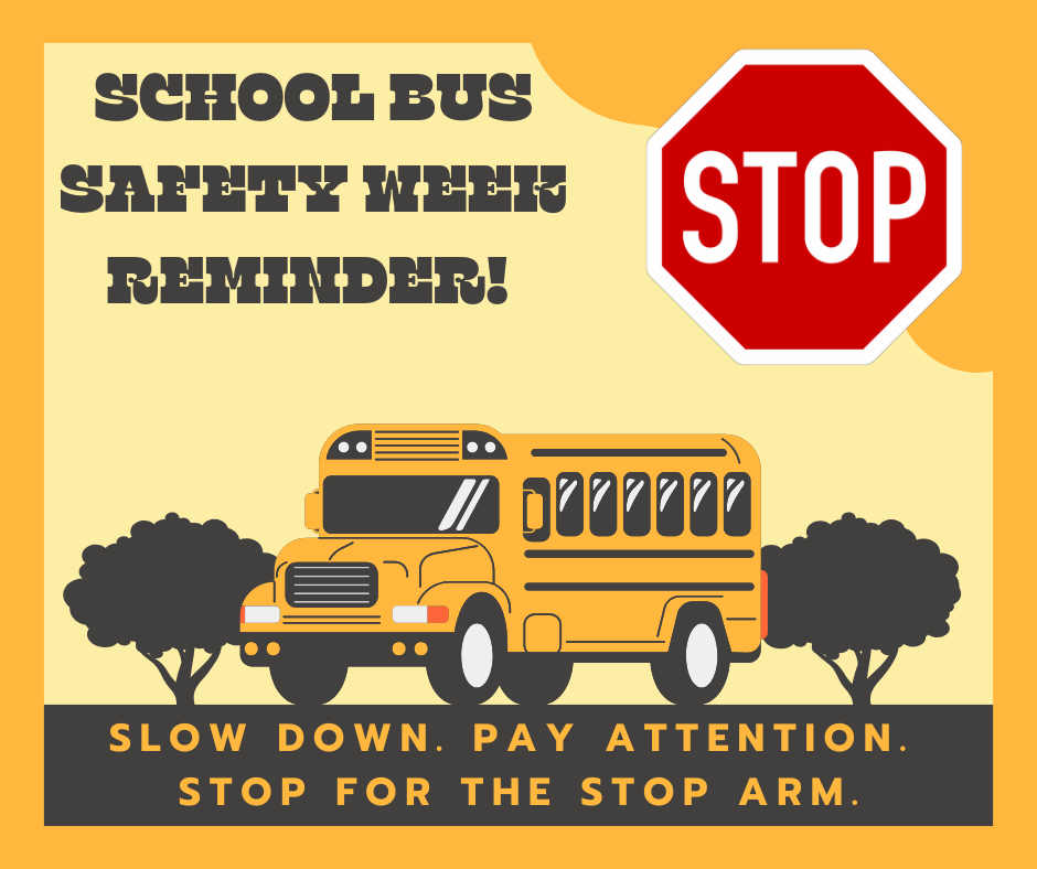 School Bus Safety Week Reminder! The image features a yellow school bus centered between two black, stylized trees against a yellow and orange background. To the right is a large red stop sign with the word "STOP" in white. Below the bus, the text reads: "SLOW DOWN. PAY ATTENTION. STOP FOR THE STOP ARM."