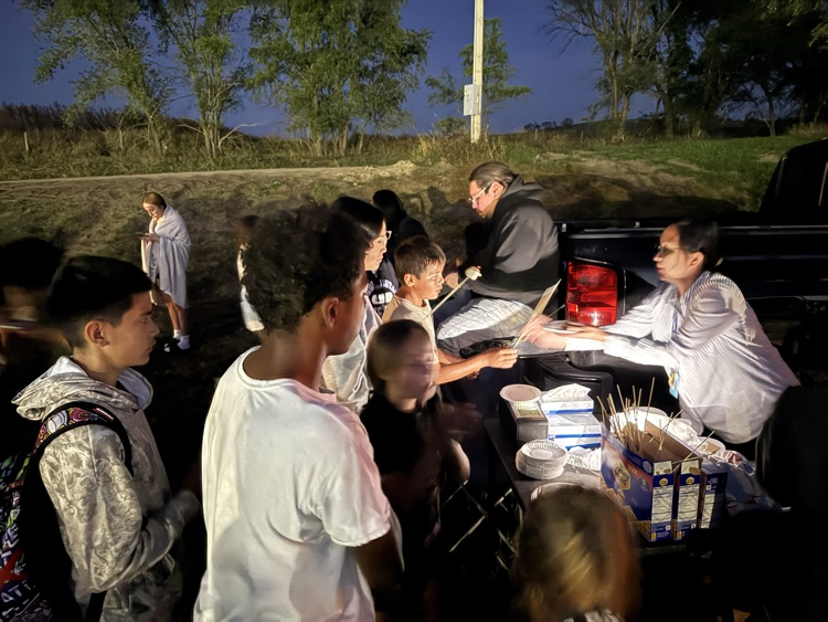 picture of students around the bonfire
