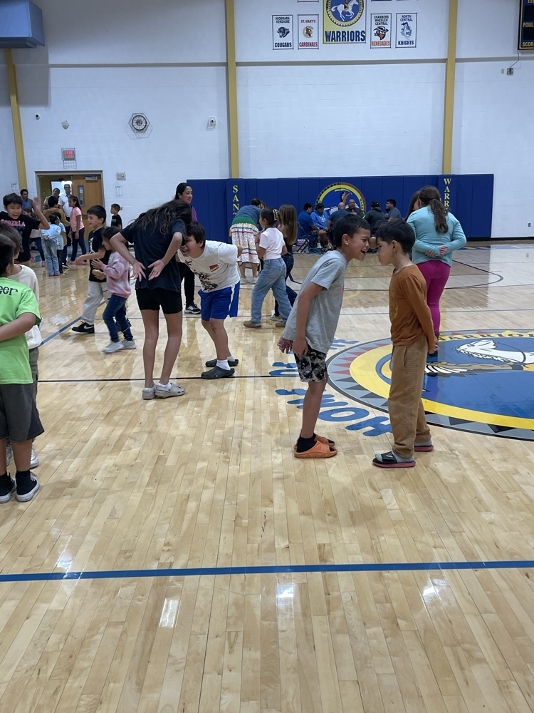 picture of staff and students doing the potato dance