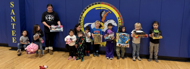 picture of students with their toys 