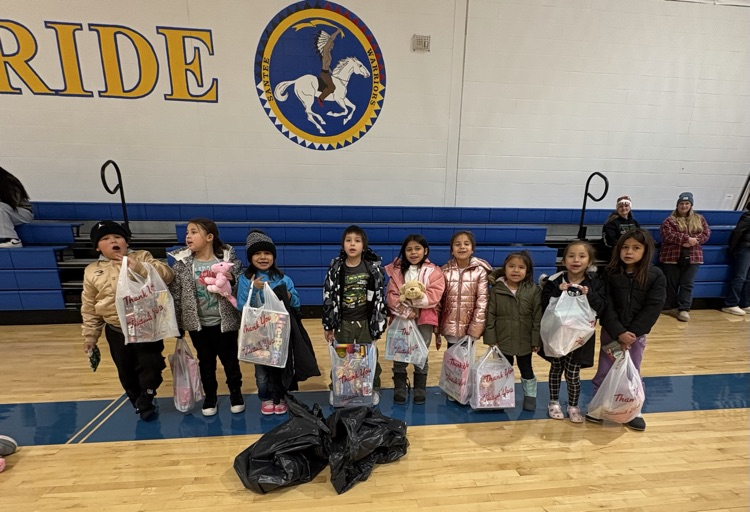 picture of students with their toys 