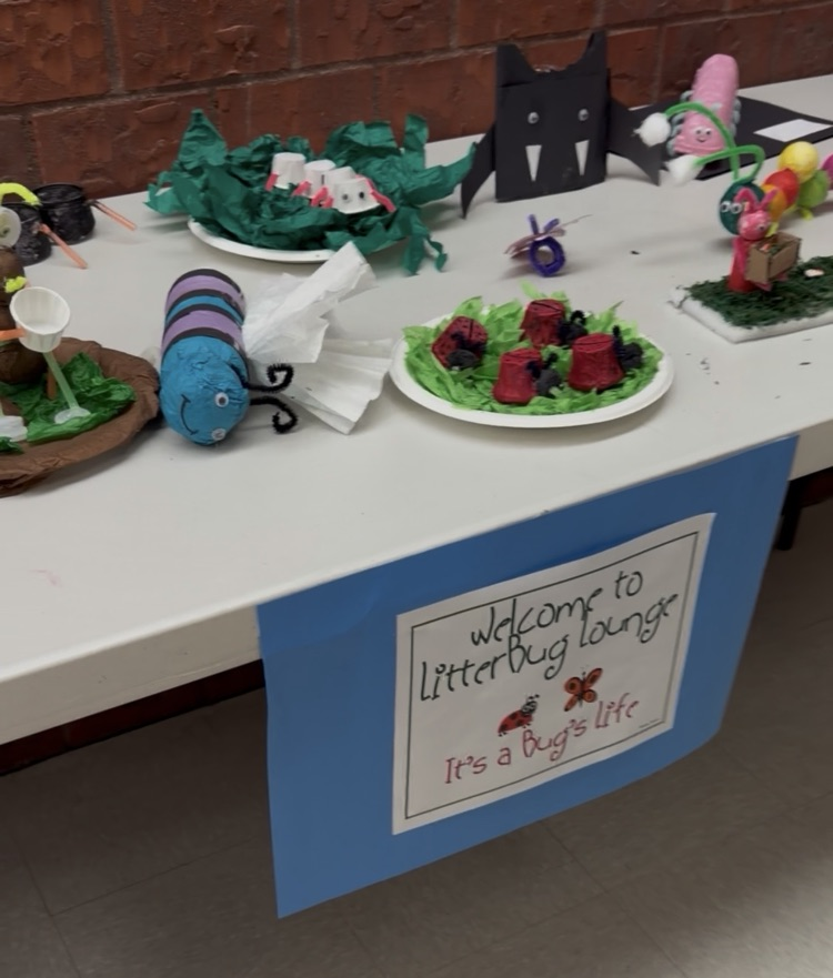 a sign that says litter lounge with art project made from litter found by the students 