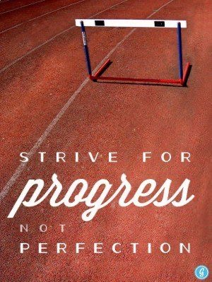 photo of a running track with the quote “strive for progress not perfection"