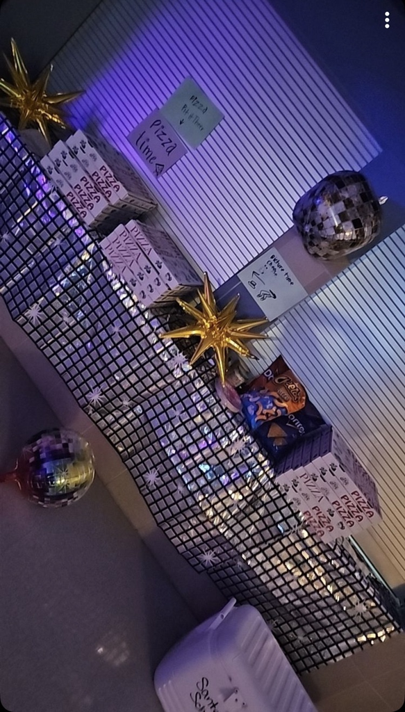 school commons area decorated with 70s decorations 