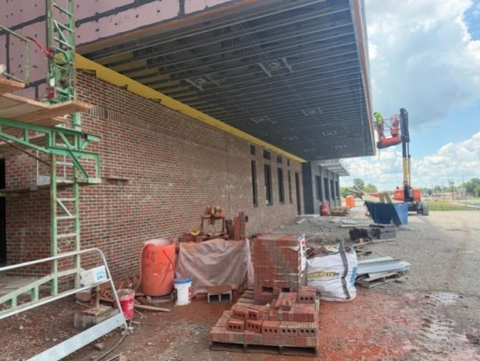 PROGRESS AS PROMISED! Take a look at the beautiful brick work happening at the future Sapulpa High School. The brick work pays homage to Sapulpa's historic red brick aesthetic while embracing modernity with lighter brick options. Architects at Reed Architecture and Interiors worked meticulously, with feedback from district leaders and faculty, to design the complex masonry, while construction managers at Nabholz Corporation ensure the work is top notch. Construction is moving fast this summer, and the future Sapulpa High School is really taking shape along Route 66!