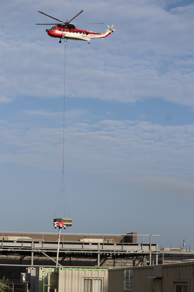 Helicopter hauling A/C unit