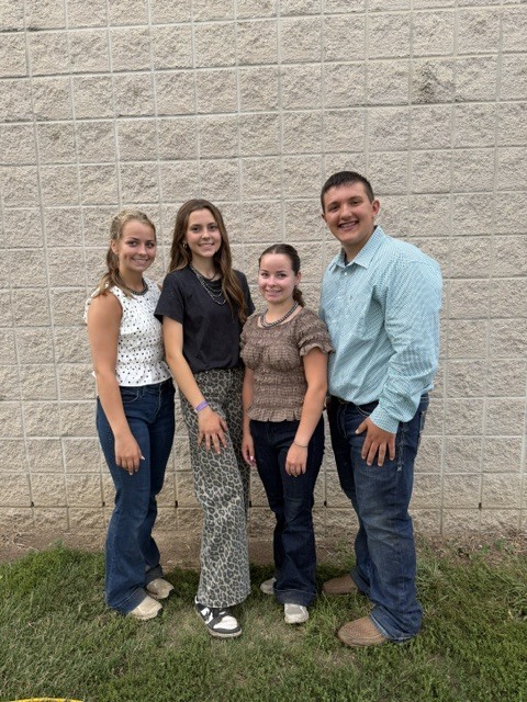 Addison Elliott, Alivia Elliott, Anna Dahms, and Caiden Hardy pose for a photo