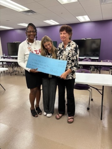 Dr. Shelley and Ava Donahue and  Rotary of Sarasota  representative