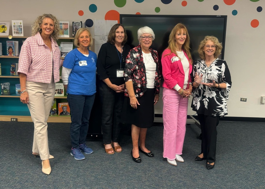 Recognized volunteers smiling
