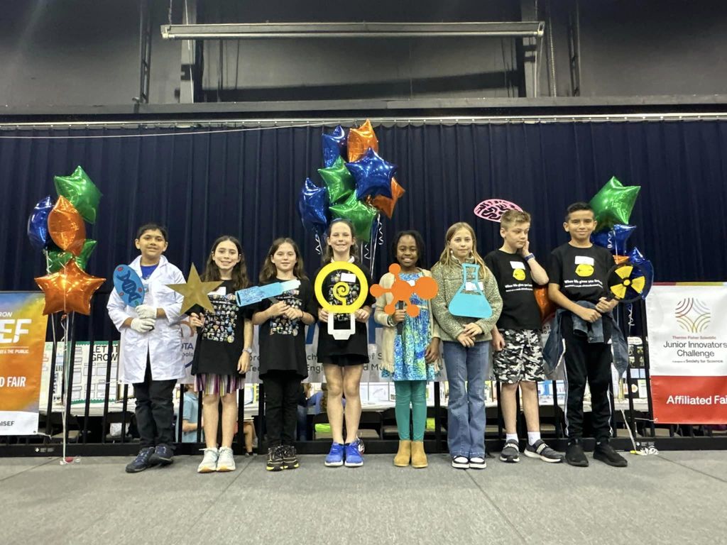 Participants smiling at the camera
