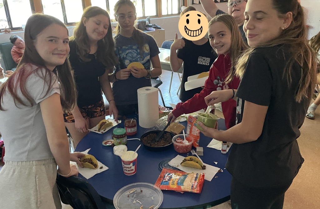 Smiling with tacos