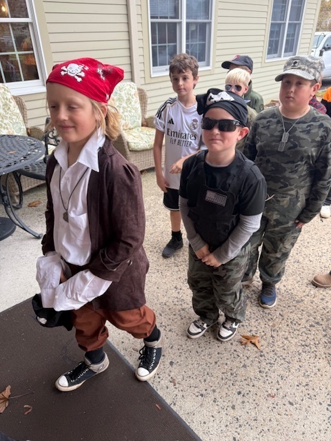 A group of students parading into Poplin.