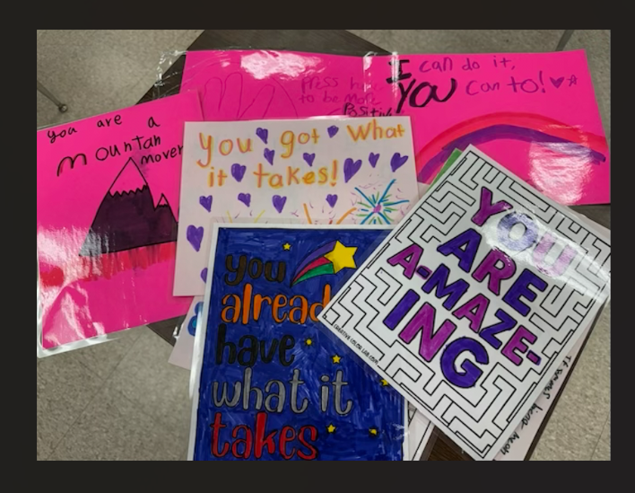 Pictures of students posters with statements like "You've already got what is takes" and "You are a mountain mover."