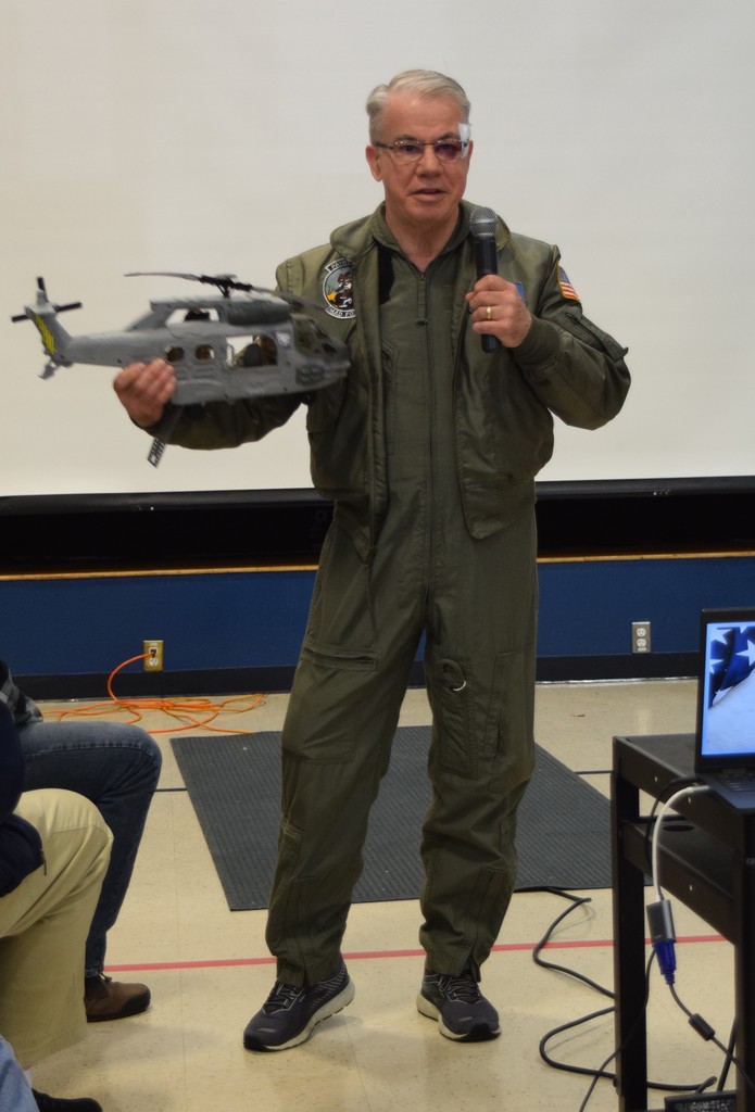 A veteran presenting about his role as a helicopter doctor