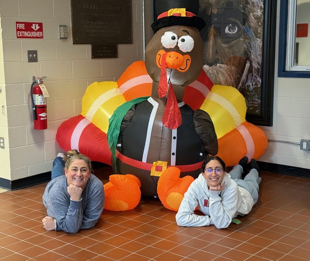 Ms. Perkins and Mrs. Rosenberg posing with the blow-up Thanksgiving turkey