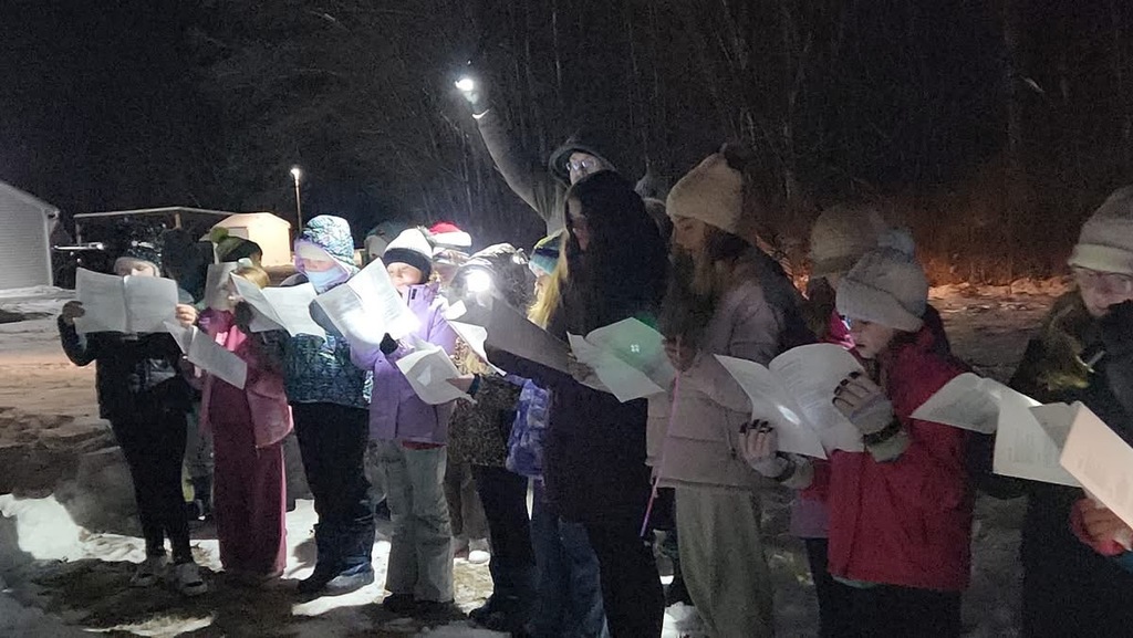 Students caroling on Friday