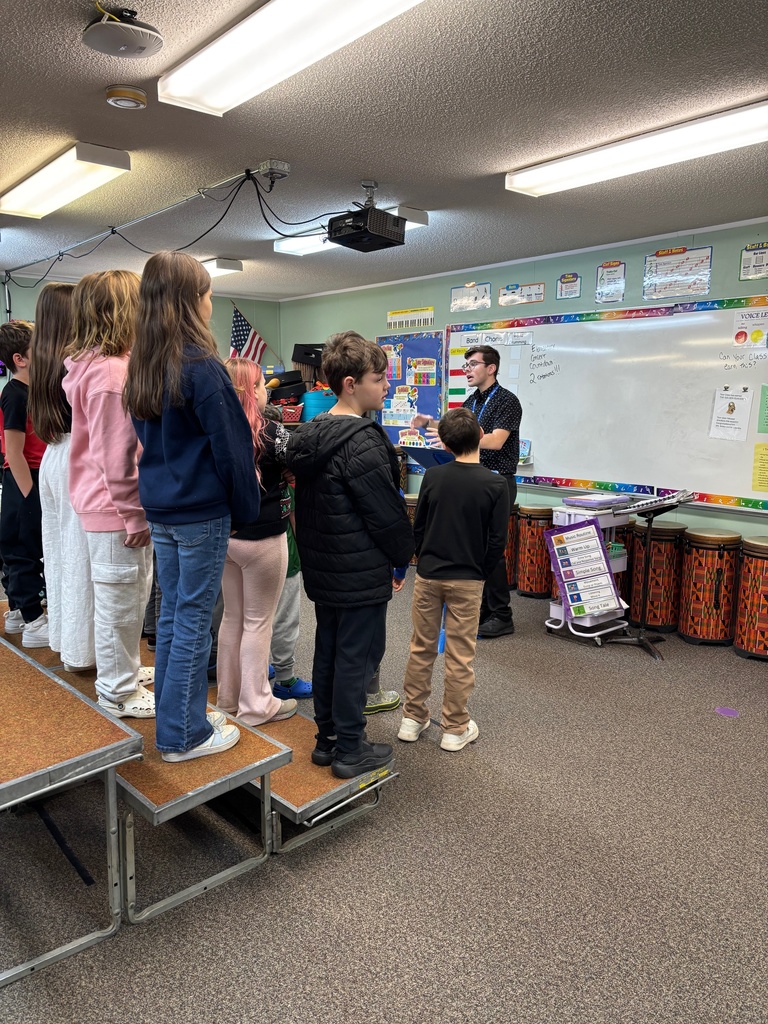 Mr. Letendre preparing for the winter concert!