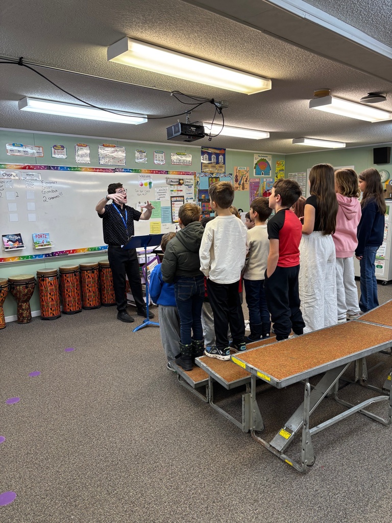 Mr. Letendre preparing for the winter concert!