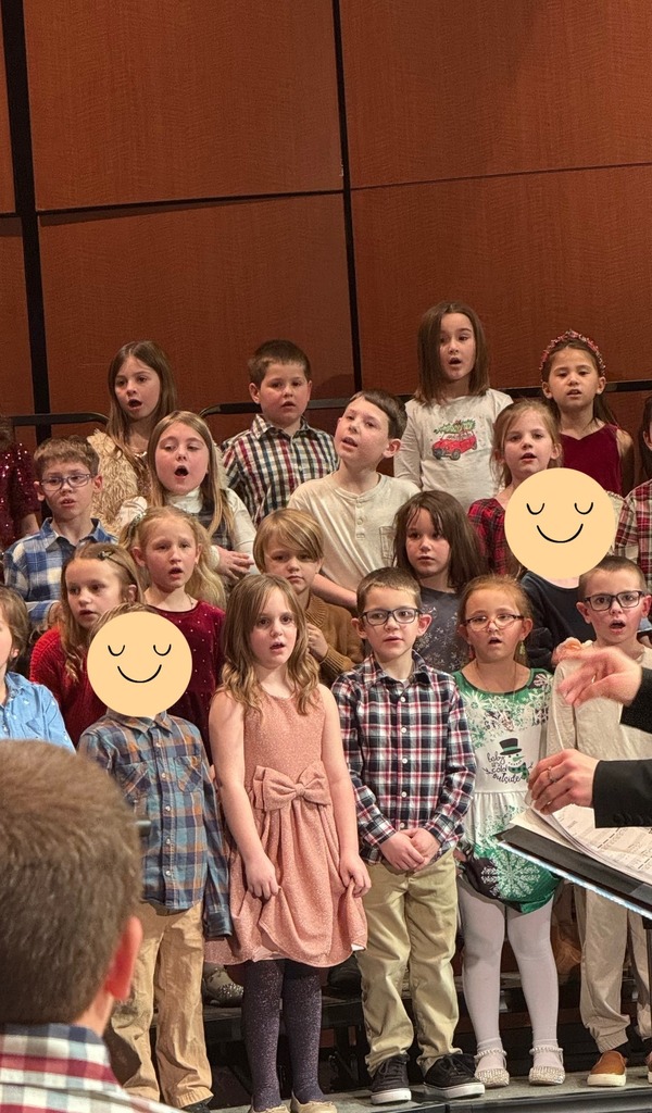 Students singing together on stage at Stockbridge Theatre