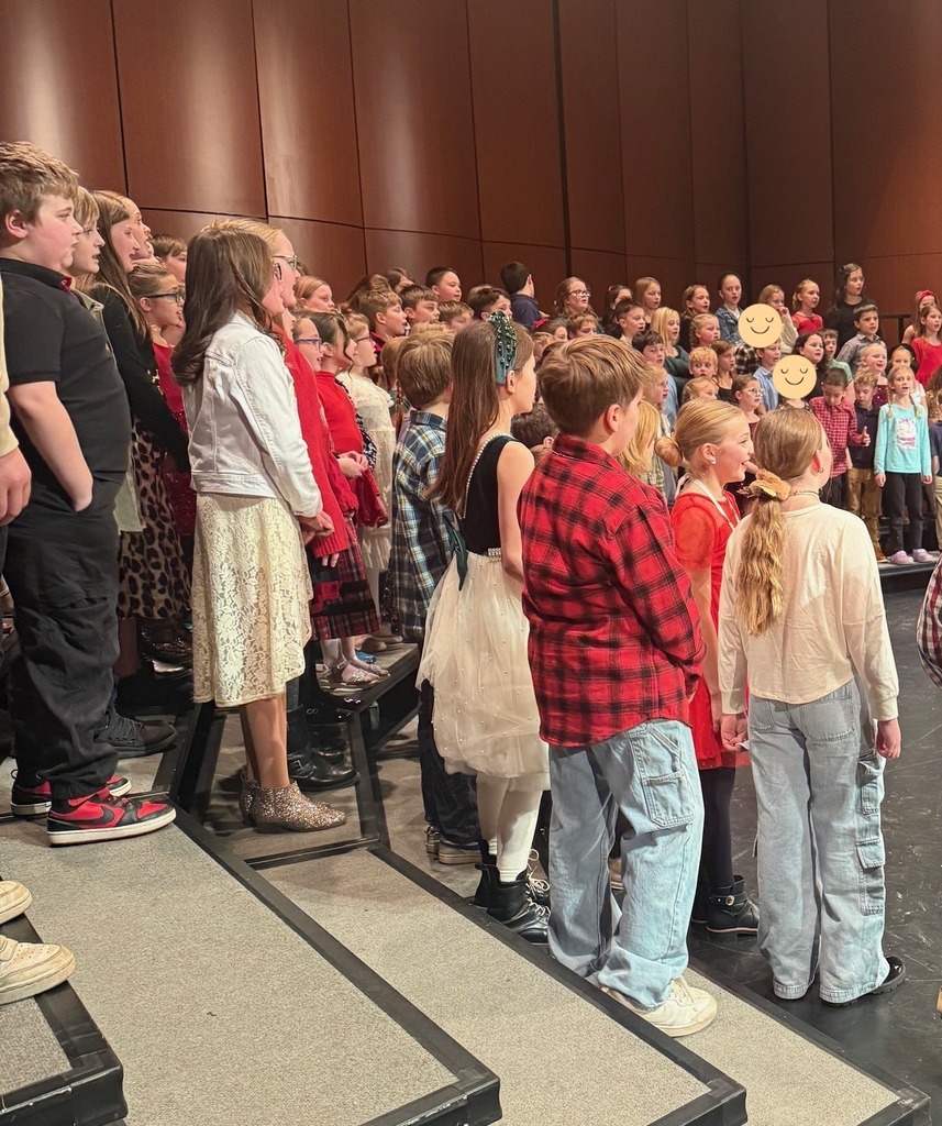 Students singing together on stage at Stockbridge Theatre