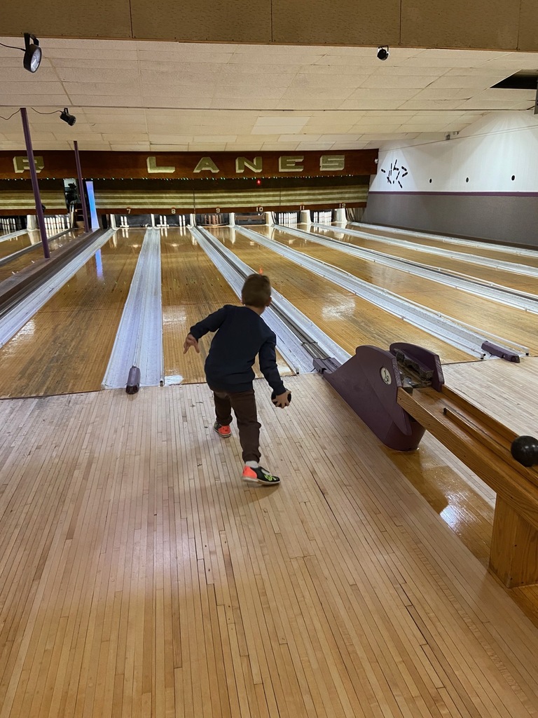A student bowling.