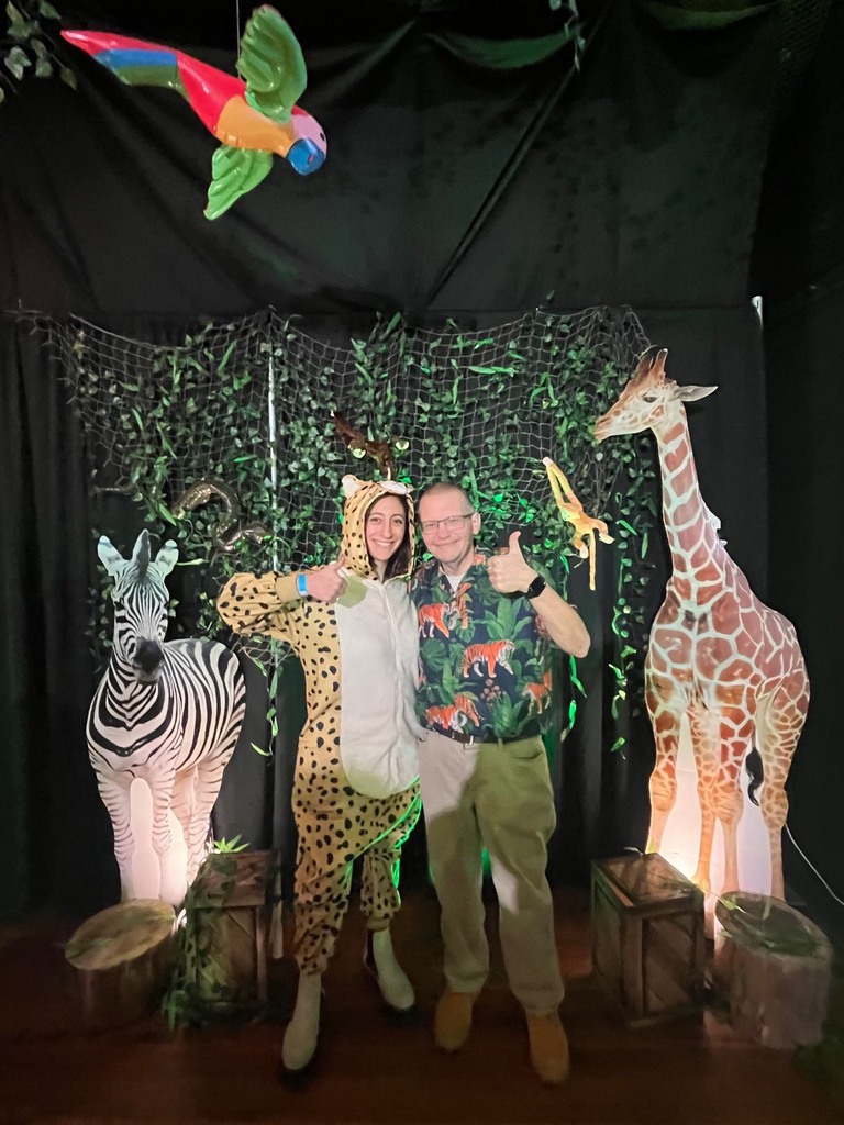 Mrs. Rosenberg and Mr. Beaudoin posing in their costumes.