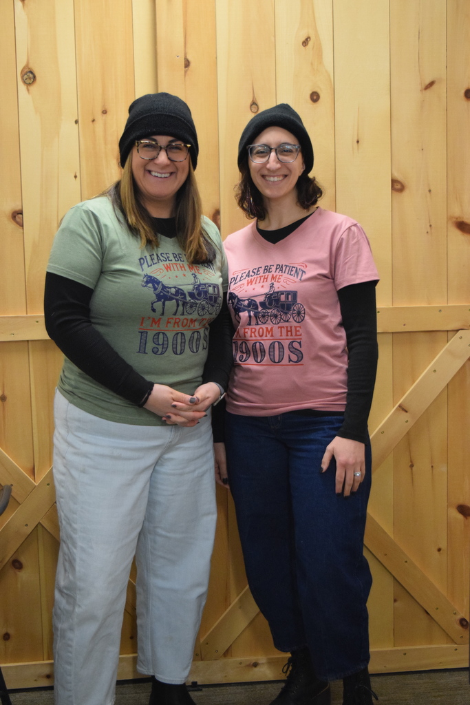 Ms. Perkins and Mrs. Rosenberg twinning in "Be patient with me. I'm from the 1900s" shirts