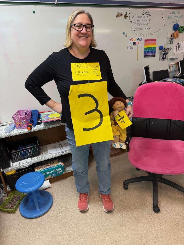 Ms. Booth as a "mixed number"  with the number "3" on her shirt and a baby doll attached to her with the fraction "1/4" affixed to it