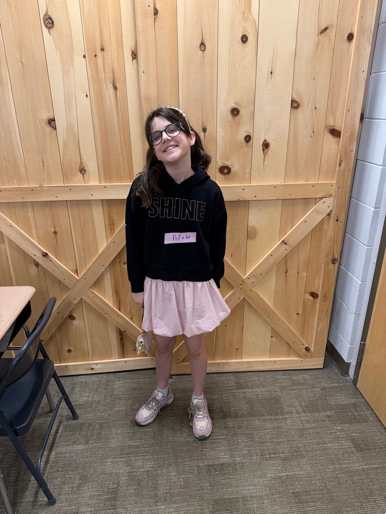 A student dressed as the word "popular"